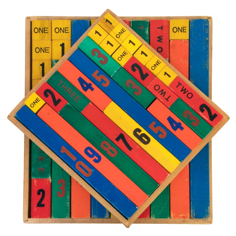 Item #1003407 Two sets of painted wooden counting blocks. EDUCATION.