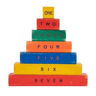 Two sets of painted wooden counting blocks