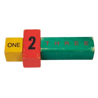 Two sets of painted wooden counting blocks